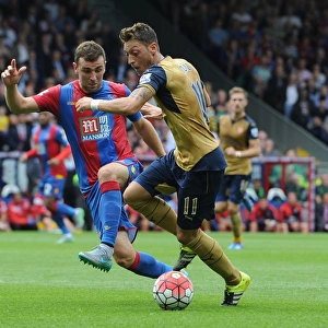 Mesut Ozil Faces Intense Pressure from James McArthur in Crystal Palace vs Arsenal Clash