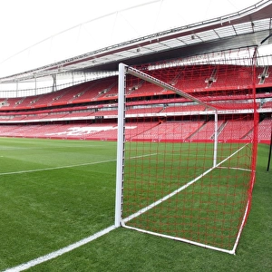 Red Nets Raise Awareness: Arsenal's Lace Up Save Lives Campaign Amidst Manchester United's Victory, Barclays Premier League, Emirates Stadium (2010)