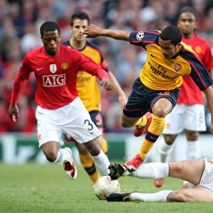 Theo Walcott (Arsenal) Michael Carrick and Patrice Evra (Man Utd)