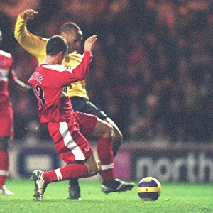 Thierry Henry shoots past Andrew Taylor and Middlesbrough goalkeeper Brad Jones to score the Arsenal goal. Middlesbrough 1: 1 Arsenal, The Premiership, The Riverside Stadium, Middlesbrough, 3 / 2 / 2007. Credit: Stuart MacFarlane / Arsenal