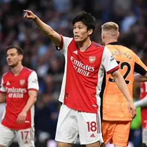 Tomiyasu Stands Firm: Arsenal's Defensive Hero in Intense Tottenham Showdown