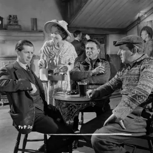 StudioCANAL Print: Jack MacGowran, Sid James and Ewan Roberts in The Titfield Thunderbolt pub scene StudioCANAL Print: Jack MacGowran, Sid James and Ewan Roberts in The Titfield Thunderbolt pub scene