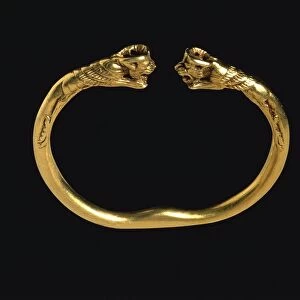 Achaemenid civilization, rigid gold bracelet with heads of winged lions, from Syria, 6th -4th century b. c