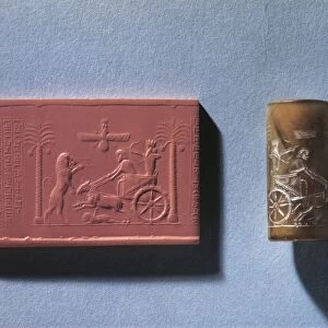 Agate cylinder seal of Darius I depicting king hunting lion from chariot and god Ahura Mazda