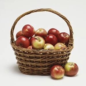 Basket of red apples, front view