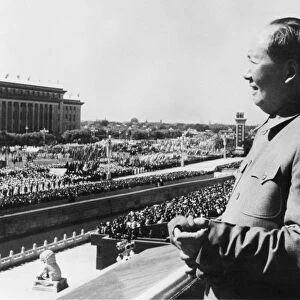 Chairman mao zedong on the rostrum in tienanmen square viewing a parade in honor of the 14th anniversary of the founding of the peoples republic of china, beijing, china, october 1963