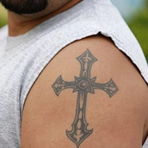 Cross tatoo
