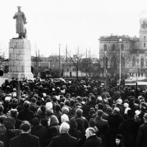A crowd gathered for the unvailing of a new monument to joseph stalin erected in front of the baltic railway station in leningrad, november 1949