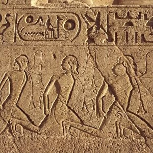 Egypt, Nubia, Abu Simbel, facade of Temple of Hator, basement of thrones with episodes from battle of Qadesh