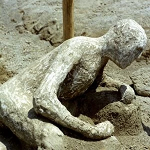 Excavations at Pompei: Petrified form of a man in Pompei overcome during the eruption