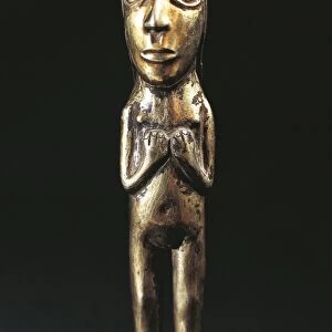 Female figurine in smelted gold shaped by cire perdue (lost-wax process for shaping metal)