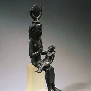 Goddess Isis offering her breast to god Horus, seated on her lap, bronze statue