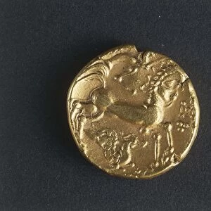 Gold Celtic stater of Cenomani (Mans region), Back side with human-headed horse