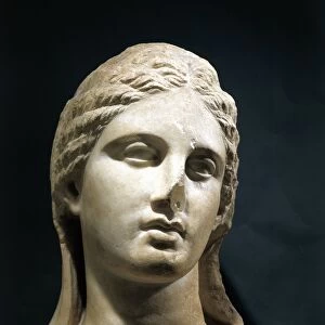 Italy, Taranto, Apulia, Sculpture of a female head with veil