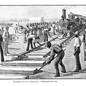 Laying sleepers and rails (permanent way) on the Transvaal Railway, Africa. Illustration