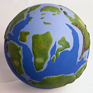 Model, globe of the Earth during the Cretaceous period, time of the dinosaurs with