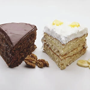 Three pieces of fruit and nut flavoured cakes