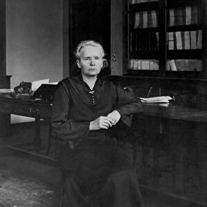 Portrait of Marie Curie in her office