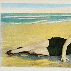 Postcard of a Sunbather at the Beach. ca. 1922, Taking a sun bath