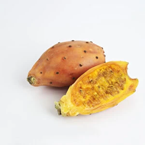 Prickly Pear cut into half on white background