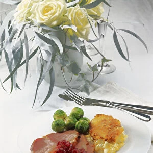 Roasted Gammon with Brussels sprouts, potatoes and cranberry sauce