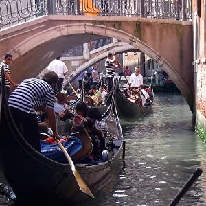 Tourists in gondolas, Venice, Italy