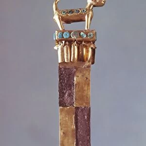 Tumi or a sacrificial ceremonial knife in gold and turquoise with bells with animal figures, Peru, Chimu civilization