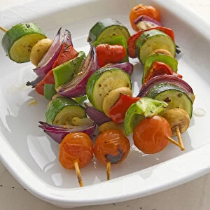 Vegetable kebabs on tray, close-up