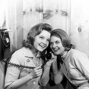 Vintage image of teenage girls on telephone