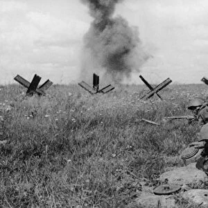 World war 2, august 1943, under cover of artillery fire, four soviet sappers disarm a section of german defenses, ukraine