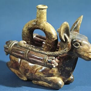 Zoomorphic polychrome terracotta vessel in shape of seated llama with load on its back, Vicus culture, circa 100 B. C