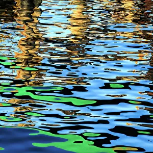 Blue and green colours reflected in the sea at the commercial dock at the Port Lincoln Wharf. Port Lincoln. South Australia
