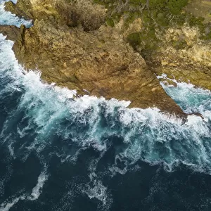 rocky outcrop into ocean