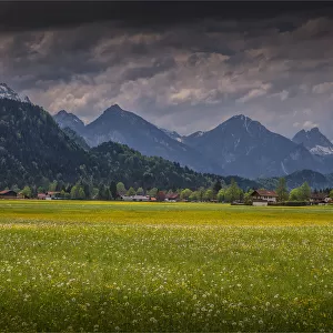 Scenic view of farmland and mountains, Neuschwantein, Bavaria, Germany