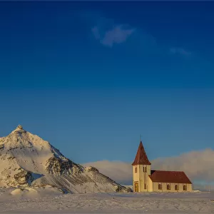 Winter scene and historic church, Arnarstapi, Snaefellness, Iceland