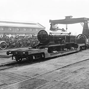 Locomotive being carried on wagons, 1914