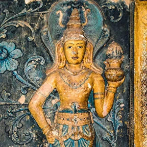 18th century frescoes and statues of Buddhism at entrance to shrine at Dambadeniya Temple (Vijayasundararama temple at Dambadeniya)