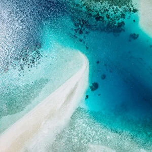 Aerial view of white sand beach and blue tropical lagoon, Ishigaki Island, Japan