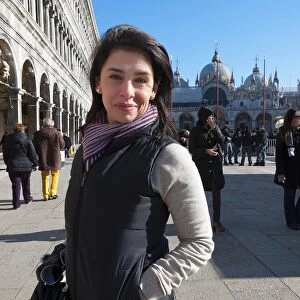 Beautiful woman in St. Marks Square Venice Italy