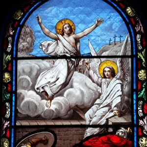 Biblical scene of the resurrected Jesus Christ on an antique stained glass window