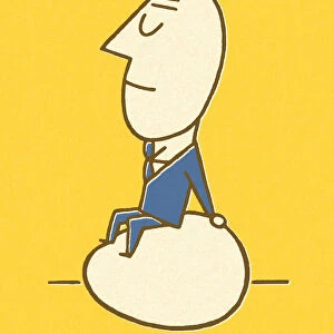 Businessman Sitting on an Egg