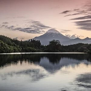 Currently inactive volcano, Mt Egmont, Mt Taranaki, reflections in Lake Mangamahoe reservoir, dam, North Island, New Zealand
