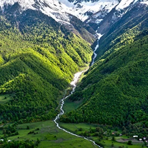 Horizontal view on Waterfall at Mountain road at Mount Ushba in the Caucasus of Georgia