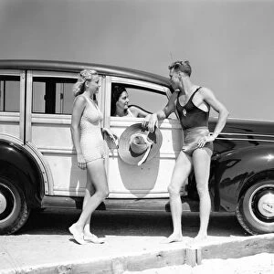 Men & Women In Bathing Suits In Front Of 1938 Ford Wood Body Station Wagon Automobile At Seashore Talking
