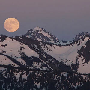 Full moon above the Olympic Peninsula, Washington, USA