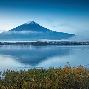Mt. Fuji reflected in Lake Kawaguchi with clouds