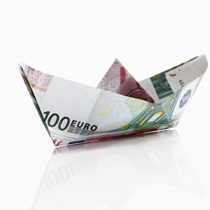 Paper boat from euro notes