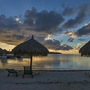 Parasols and sun loungers on the beach, evening atmosphere, Moorea, French Polynesia