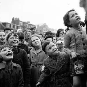 Print of a 1955 photograph showing Punch and Judy on Rothesay beach Print of a 1955 photograph showing Punch and Judy on Rothesay beach