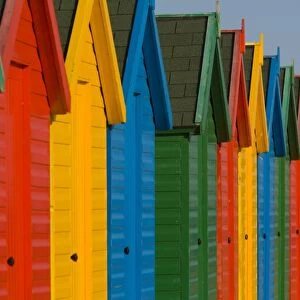 Row of multi-coloured beach huts